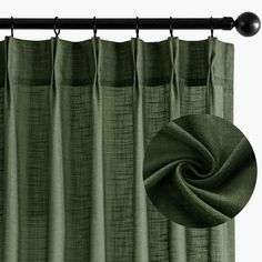 a green curtain hanging on a black rod