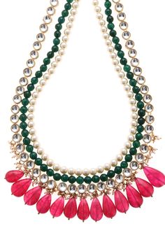 Red Green Gold plated Indian Necklace featuring glass kundan work, pearl embellishments with green onyx stones and plated with 22kt gold. This pretty necklace are a perfect match to all things pastels. Perfect to wear to dinner, and perfect gift for family members, friends or bridesmaid. LENGTH Earrings Length - 26 inches DETAILS -100% top Quality Faux Glass Polki -22K gold and silver Plated silver copper alloy. -Handcrafted in our all girls workshop in Paisley Pop Studio, Jammu and Kashmir STYL Festive Green Beaded Necklace With Pearl Chain, Diwali Green Jeweled Necklaces, Green Onyx Stone, Rakhi Design, Stone Necklace Set, Stones Necklace, Indian Necklace, Bangles Indian, Kundan Necklace