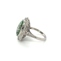 This stunning ring by Regard Jewelry features a 10.00ct Merelani Mint Tsavorite GIA & .79tcw Diamond Angular in a 10.4g platinum setting, size 6.75. It makes for an eye-catching sparkle of timeless elegance. Platinum 10.00ct Merelani Mint Tsavorite GIA & .79tcw Diamond Angular Ring at Regard Jewelry in Austin, Texas Timeless Elegance, Austin, Platinum, Mint, Sparkle, 10 Things