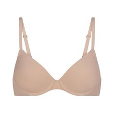 The T-Shirt Bra That Started It All. This Classic Foundation With Demi Coverage Has 360-Stretch Technology For A Custom-Made Fit Even When You’re Between Sizes. Made Of Our Signature Buttery-Soft Fabric With A Second-Skin Feel That Makes You Forget You’re Wearing A Bra. Offers Unparalleled Support With Its Lightly Lined Cups And Flexible Underwire That Doesn’t Dig. Features Adjustable Straps And A Hook And Eye Closure In The Back. Fits True To Your Skims Bra Size. Summer Wishlist, Sheer Bralette, Most Comfortable Bra, Comfortable Bras, Triangle Bralette, Birthday List, Material Girl, Material Girls, T Shirt Bra