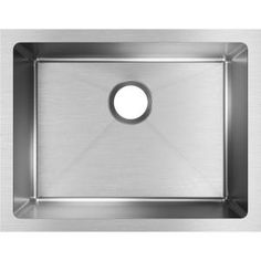 a stainless steel sink with an oval hole in the center