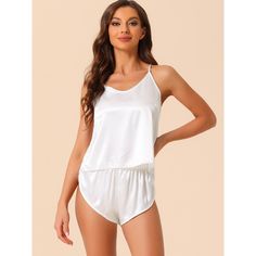 This style of lounge set is easy to put on or take off, giving you a light and simple dressing experience, keeping you nice and comfortable all day. Top: Cami crop tops feature a tie back and adjustable spaghetti strap. Bottom: shorts featured elastic waist. The soft pajamas set for women is smooth, lightweight, breathable, and comfortable to wear. This pajama set is casual and classy, even if a guest visits suddenly, you won't feel embarrassed, making your home life more convenient. The pajama Simple Dressing, Lounge Pajamas, Soft Pajamas, Sleepwear Sets, Satin Pajamas, Cami Crop Top, Loungewear Sets, Pajamas Set, Lounge Set