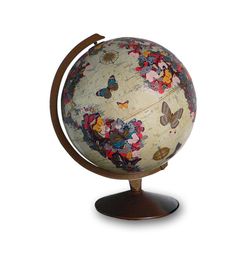 a decorative globe with butterflies on it