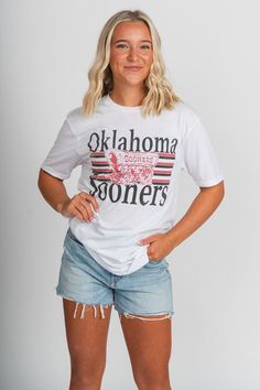 OU Sooners schooner lines unsiex t-shirt from Lush Fashion Lounge women's boutique in Oklahoma City. Lush boutique in Oklahoma is known for a large selection of Okie apparel, Oklahoma t-shirts and OU Sooners gameday apparel. Officially licensed by the University of Oklahoma. Unisex fit. 50% polyester 25% cotton 25% rayon Female model is 5'4 size 25 wearing small. Male model is 5'8 wearing size large. Ou Sooners, The University Of Oklahoma, University Of Oklahoma, Oklahoma Sooners, Women's Boutique, Female Model, Oklahoma City, Ladies Boutique, Male Model