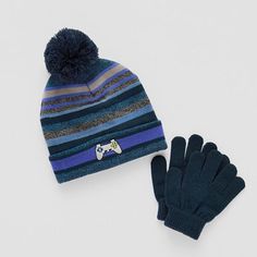 Prep his outerwear look for the chilly weather with the addition of this big boy's Capelli of N.Y. cold weather set. It includes a striped knit hat with a pom-pom at the top and a pair of gloves with elastic cuffs for comfort.# Pieces In Set: 2Included: 1 Hat(s), 1 Glove(s)Features: CuffedWarmth Factor: LightweightFiber Content: 100% AcrylicFabric Description: KnitCare: Tumble Dry, Machine WashCountry of Origin: Imported Chilly Weather, Winter Accessories, Knit Hat, Striped Knit, Big Boys, Kids Boys, Cold Weather, Knitted Hats, Pom Pom