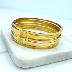 Matching Mommy and Me Stainless Steel Gold Flat Bangle Bracelet, Bangle Bracelet Set of 7, Kids or Women, Stackable Bangles Bracelet.- Bracelet Size:Medium: Width: 68mm | Thickness: 2mmSmall: Width: 55mm | Thickness: 1mm Mom And Me, Stackable Bangles, Matching Mom, Bangle Bracelet Set, Gold Flats, Anklet Bracelet, Bracelet Bangle, Chain Choker, Gold Set