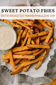 sweet potato fries with roasted marshmallow dip in a bowl and on parchment paper