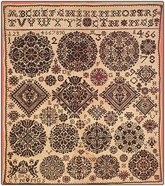 an old rug with many different designs on it