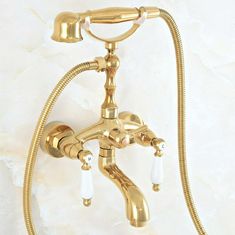 an old fashioned brass faucet is shown on the wall