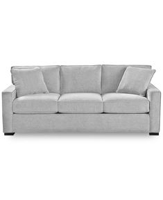 a white couch on a white background with no one in it's place to sit