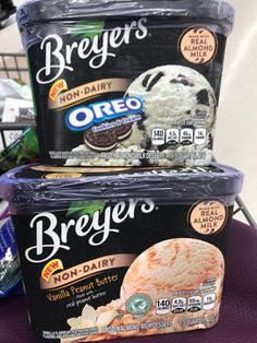 two ice cream containers stacked on top of each other