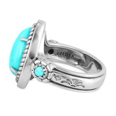 This beautiful ring features one large 10x15 mm teardrop-shaped genuine Kingman Turquoise and is flanked by 2 additional smaller round Kingman Turquoise gemstones. All are prong-set in nickel-free .925 Sterling Silver with rope border detailing, concha flower and fan designs and an oxidized, polished finish. Kingman Turquoise is prized for its rich blue hues and distinctive black or brown matrix, sourced from the Kingman Mine in Arizona, one of the oldest and most productive Turquoise mines in t Elegant Turquoise Teardrop Rings, Round Turquoise Ring With Gemstone Accents, Oval Turquoise Ring With Polished Finish, Turquoise Ring With Bezel Setting For Anniversary, Anniversary Turquoise Ring With Bezel Setting, Blue Cabochon Teardrop Ring, Blue Teardrop Cabochon Rings, Blue Turquoise Teardrop Ring For Anniversary, Blue Teardrop Turquoise Anniversary Ring