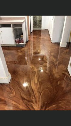 a kitchen floor that has been painted brown