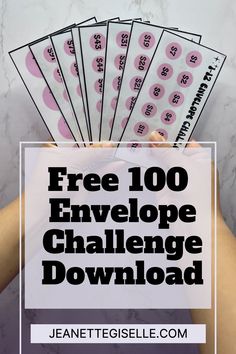 someone holding up five envelopes with the text free 100 envelope challenge printable on them