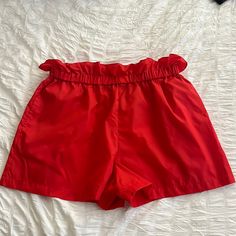 Lightweight Nylon Shorts (Unlined) With Side Pockets. Elastic Waist With Paperbag Style Ruffle. Love Them But I Prefer A Heavier Fabric. I Paid $56 Chic Nylon Shorts For Summer, Chic Summer Nylon Shorts, Chic Red Beach Shorts, Stretch Red Bottoms For Day Out, Red Nylon Shorts, Chic Stretch Red Shorts, Chic Red Stretch Shorts, Chic Red Bottoms For Vacation, Chic Red Beach Bottoms