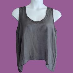 Flowy Dark Gray Silk Tank Top With Longer Side And Back Hem Made From Slightly Sheer Silk By Cp Shades. This Silze L Top Fits Loosely Fits A Myriad Of Body Types Including A Zize Up And A Size Down. Never Worn, New With Tag. Cropped Tank Top For Summer Layering, Summer Cropped Tank Top For Layering, Summer Cropped Viscose Tops, Cropped Tops For Layering In Summer, Cropped Tops For Summer Layering, Chic Scoop Neck Summer Blouse, Chic Summer Blouse With Scoop Neck, Gray Summer Tank Camisole, Second-skin Camisole With Adjustable Straps