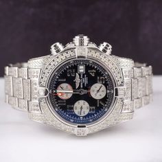 Breitling Avenger ll Chrono 43mm Watch Customized With 12.00 Carats of Genuine Diamonds! The Entire Case, Band Buckle, and Bezel Have Been Beautifully Handset in White "SI" Round Brilliant Cut Diamonds. The Diamonds are G/H in Color. Retail Price After Customization Over $12,000. Size: 43 mm.  Color: Blue.  Gender: male.  Age Group: adult. Silver Luxury Chronograph Watch For Anniversary, Luxury Silver Chronograph Watch For Anniversary, Luxury Silver Diamond Watch With Tachymeter, Diamond Chronograph Watch With Round Dial, Round Diamond Chronograph Watch For Anniversary, Luxury Diamond Automatic Watches, Luxury Diamond Chronograph Watch For Formal Events, Silver Diamond Watch With Tachymeter, Blue Diamond Watch With Round Dial