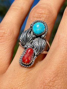 Beautiful southwestern style vintage Turquoise ring that is Native American made Size 5.75 US Comes in recycled and compostable gift box and mailer Vintage Turquoise Coral Southwestern Sterling Ring Untreated Southwestern Turquoise Ring Gift, Southwestern Turquoise Ring Round Shape For Gift, Southwestern Style Turquoise Ring As A Gift, Southwestern Style Turquoise Ring For Gifts, Southwestern Style Round Turquoise Ring For Gift, Southwestern Style Red Turquoise Ring, Vintage Turquoise Ring, Carnelian Ring, Southwestern Style