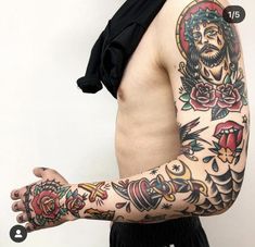 a man with many tattoos on his arm