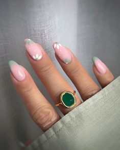 50+ Spring Nails For A Stunning Manicure! - The Pink Brunette Sage Green Almond Nails French Tip With Flowers, Green Nail Tip Designs, Sage Green Easter Nails, Sage Flower Nails, Green Spring Nail Designs, Sage Floral Nails, Sage Nails With Flowers, Easter Green Nails, Sage Green Floral Nails