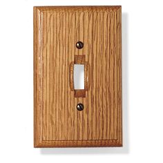 a wooden light switch cover on a white wall