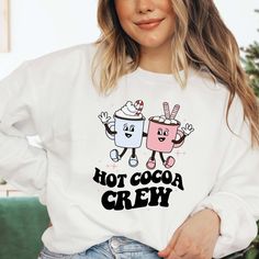 Hot Cocoa Crew Sweatshirt - Limeberry Designs Fun Winter Sweatshirt With Cartoon Print, Winter Fun Sweatshirt With Cartoon Print, Fun Cotton Sweatshirt For Winter, Fun Winter Sweatshirt With Letter Print, Fun White Sweatshirt For Winter, Winter Cartoon Print Sweatshirt For Loungewear, Winter Loungewear Sweatshirt With Cartoon Print, Winter Cartoon Print Tops For Loungewear, Funny Graphic Print Sweatshirt For Winter