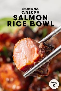 the cover of crispy salmon rice bowl, with chopsticks holding up meat