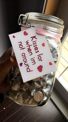 a jar filled with lots of coins and a note that says, i love you