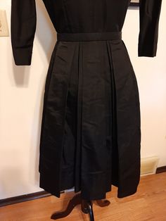 "Mid Century Womens Black Rayon Satin Taffeta Special Occasion Dress Size S Very Good Vintage Condition, No Rips Or Tears, Deodorant Residue Mainly Inside Under Arms. Will Need To Be Cleaned. Dress Has Been Hemmed Up And Could Be Let Down For A More Authentic 40s Length. No Labels Seen Fabric Appears To Be A Rayon Or Silk Satin Taffeta Beautiful Fabric, Not Sure Photos Give Justice Rounded/Boat Neckline 7 Covered Buttons In Front For Decor Closure Is Small Black Snaps And 1 Hook At Waist Raglan Coverall Jumpsuit, Let Down, Pin Up Dresses, Rockabilly Dress, Rayon Dress, Boat Neckline, Pink Satin, Covered Buttons, Black Satin