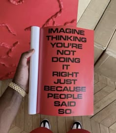 someone is holding up a book that says imagine thinking you're not doing it right because people said so