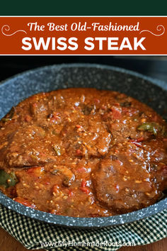 the best old - fashioned swiss steak in a skillet with text overlay that reads, the best old - fashioned swiss steak