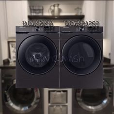 two washers sitting next to each other in a room