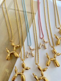 Balloon Dog Colored necklaces Balloon Dog Jewelry, Balloon Dog Necklace, Trendy Hypoallergenic Gold Necklaces, Playful Gold Jewelry With Adjustable Chain, Playful Hypoallergenic Jewelry For Party, Playful Hypoallergenic Party Jewelry, Playful Adjustable Silver Necklace, Gold Enamel Party Necklace, Gold Enamel Necklace For Party