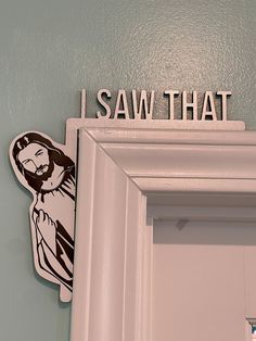 i saw that sticker on the wall next to a door with an image of jesus