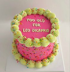 a birthday cake that says too old for led diaperio on the top, with sprinkles around it