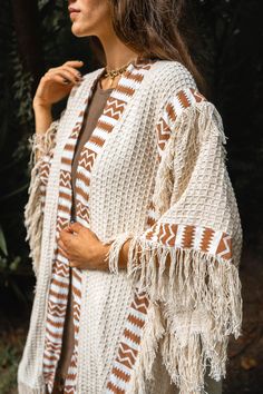 Adopt a bohemian loose-fit look with this ivory-colored tribal kimono in 100% cotton. Ideal for cooler summer nights, festivals or ceremonies. Mixed model, suitable for men and women.  ༶ ༶ ༶ ༶ ༶ ༶ ༶ ༶ ༶ ༶ ༶ ༶ ༶ ༶ ༶ ༶ ༶ ༶ ༶ ༶ ༶ ༶ ༶ ༶ ༶ ༶ ༶ ༶ AVAILABILITY The kimono is available in other earthy colors :  - Brown Color : https://www.etsy.com/listing/1781191615 - Rust Color : https://www.etsy.com/listing/1766994078 ༶ ༶ ༶ ༶ ༶ ༶ ༶ ༶ ༶ ༶ ༶ ༶ ༶ ༶ ༶ ༶ ༶ ༶ ༶ ༶ ༶ ༶ ༶ ༶ ༶ ༶ ༶ ༶ MEASUREMENTS DETAILS Our prod Festival Cape, Mixed Models, Natural Clothing, Boho Jacket, Ladies Poncho, Colors Brown, Conscious Fashion, Eco Friendly Fabric, Earthy Colors