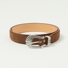 This traditional western style belt has been hand made in Italy, by the good people at Shangri-La Heritage, and has been cut from a smooth and durable full-grain, veg-tanned Italian Bullhide leather. Custom engraved silver hardware can be found throughout, this unique piece, with work performed by some of the most skilled craftspeople in the world. Traditional western style belt Full-grain, veg-tanned Italian leather Silver buckle from Italy 4cms to 3cms Adjustable loops Burnished edges Hand-made in Italy Unique Belts, Wild Star, Workwear Boots, Moc Toe Boots, Slimmer Belt, Mountaineering Boots, Wing Shoes, Red Wing Shoes, Vintage Sneakers