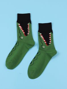 Color: Multicolor Composition: 100% Polyester Material: Fabric Pattern Type: Cartoon Type: Crew Socks Product Measurements in cm : Size Height Length Width one-size 20 19 8 Crocodile Alligator Crew Socks Funny Socks for Men Novelty Socks Funky Socks Here we have our vibrant and playful line of Socks, where fun and fashion collide! These socks are designed to add a touch of joy and individuality to your wardrobe. With a wide range of unique patterns, bold colors, and quirky designs, our Socks are the perfect accessory to showcase your personality and make a statement. Key Features: Comfortable Fit: We understand the importance of comfort, which is why our socks are made with soft, breathable materials that provide a cozy and snug fit. They feature a blend of high-quality fabrics that keep y Cool Socks For Men, Funny Socks For Men, Mens Novelty Socks, Men Cartoon, Funky Socks, Stylish Socks, Sock Animals, Mens Loungewear, Funny Socks