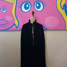 Bring Some Drama Into The Night Wearing This Vintage Black Velvet Cape By Eugene Alexander. Simply Timeless. Tassels On Front Are Slightly Discolored. No Size Tag Measurements Across Shoulders - 19 In. Across Waist - 33 In. Across Hips - 38 In. Length - 36 In. Front, 43 In. Back Material: Feels Like Silk Velvet, Not Material Tag Made In The Usa Vintage Black Cape For Winter, Vintage Black Winter Cape, Black Cape For Party, Vintage Black Outerwear For Party, Cape Cloak, Velvet Cape, Into The Night, Silk Velvet, Cloak