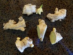 several pieces of food that have been cut up and placed on a counter top with one piece missing