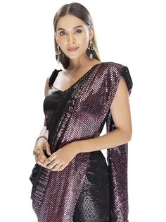 Black And Wine Saree is the epitome of elegance, perfect for Parties, festivals, engagements, gatherings, and special occasions. The amazing Black and Wine saree has georgette fabric that is lightweight and absorbent making it perfect to be worn for long durations. Glamorous Festive Pre-draped Saree With Sheer Dupatta, Elegant Pre-draped Saree For Party Season, Fitted Bollywood Style Pre-draped Saree For Festive Occasions, Traditional Pre-draped Saree For Festive Party, Party Pre-draped Saree With Mirror Work In Art Silk, Festive Pre-draped Saree With Zari Work For Party, Glamorous Festive Pre-draped Saree For Celebration, Festive Pre-draped Saree For Party Season, Festive Evening Lehenga In Georgette