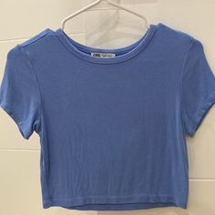 Light Flow Material Baby Blue Round Neck Top Zara Youth Girls Large Never Used Perfect Condition Cute Fitted Blue T-shirt, Blue Fitted Basic Tops, Fitted Blue Basic Tops, Light Blue Plain Casual Top, Plain Blue T-shirt For Spring, Basic Light Blue Plain Top, Basic Light Blue Plain Tops, Light Blue Plain Tops For Spring, Plain Light Blue Tops For Spring