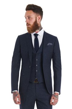 This Moss London slim fit blue speckled 3 piece suit is single breasted with a notch lapel. It has two outer pockets and an outer breast welt. When selecting your size please note that the size advertised is the jacket chest size, the trouser accompanying this suit will be a 6" drop from chest to waist, i.e. a 40R chest suit will come with a 34R waist trouser. If you are not the set suit size, we recommend that you look at our Mix and Match suit section. Wedding Dress Suit, Moss Bros, Slim Fit Suits, Groom Attire