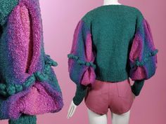 An absolute novel piece! This designer 1980s new wave sweater just radiates drama & is guaranteed to turn some heads.  Hand-knit ombre bouclè pullover made of all natural fibers in iconic neo 1980s color tones. There's a boat neck, drop shoulders, & exaggerated long puffy mutton sleeves. The ribbing on the sleeves can be worn long, which I LOVE, or cuffed, creating a little different look, but beautiful just the same. The bottom edge has 3 inches of chunky ribbing as well, adding even more chara 1980s New Wave, Wave Sweater, 80s Sweater, Color Tones, Pullover Sweater Women, Fabric Tags, Vintage Wool, Wool Sweater, New Wave