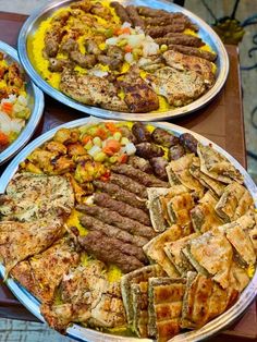 three plates filled with different types of food