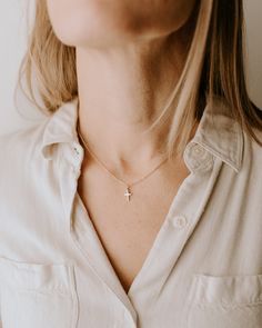 Where everyday elegance meets personal significance, our Cross Necklace is a beautifully delicate statement of faith. Its refined design adds a touch of grace to any outfit while holding deep, personal meaning. ∙ D E T A I L S ∙  -  Gold Filled Chain - 16, 18, or 20 inches - Hypoallergenic (lead + nickel free) The Pendant Details: - 18k Gold Filled -7 mm x 10 mm ∙ G O L D ∙ F I L L E D ∙ Gold-filled components contain 100+ times more real gold than gold-plated components and are both durable and Necklace Drawing, Dainty Cross Necklace, Dainty Necklace Layered, Cross Charm Necklace, Faith Necklace, Unique Pendant Necklace, Cheap Necklaces, Everyday Elegance, Jewelry Essentials