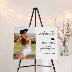 a welcome to hannah's graduation photo on an easel