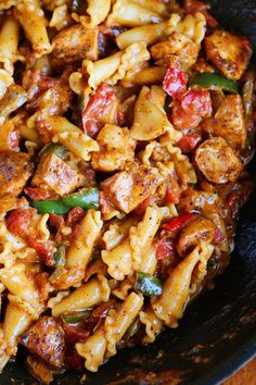 pasta with meat and vegetables in a skillet