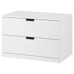 a white dresser with two drawers on it