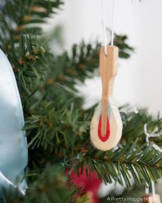 an ornament hanging from a christmas tree